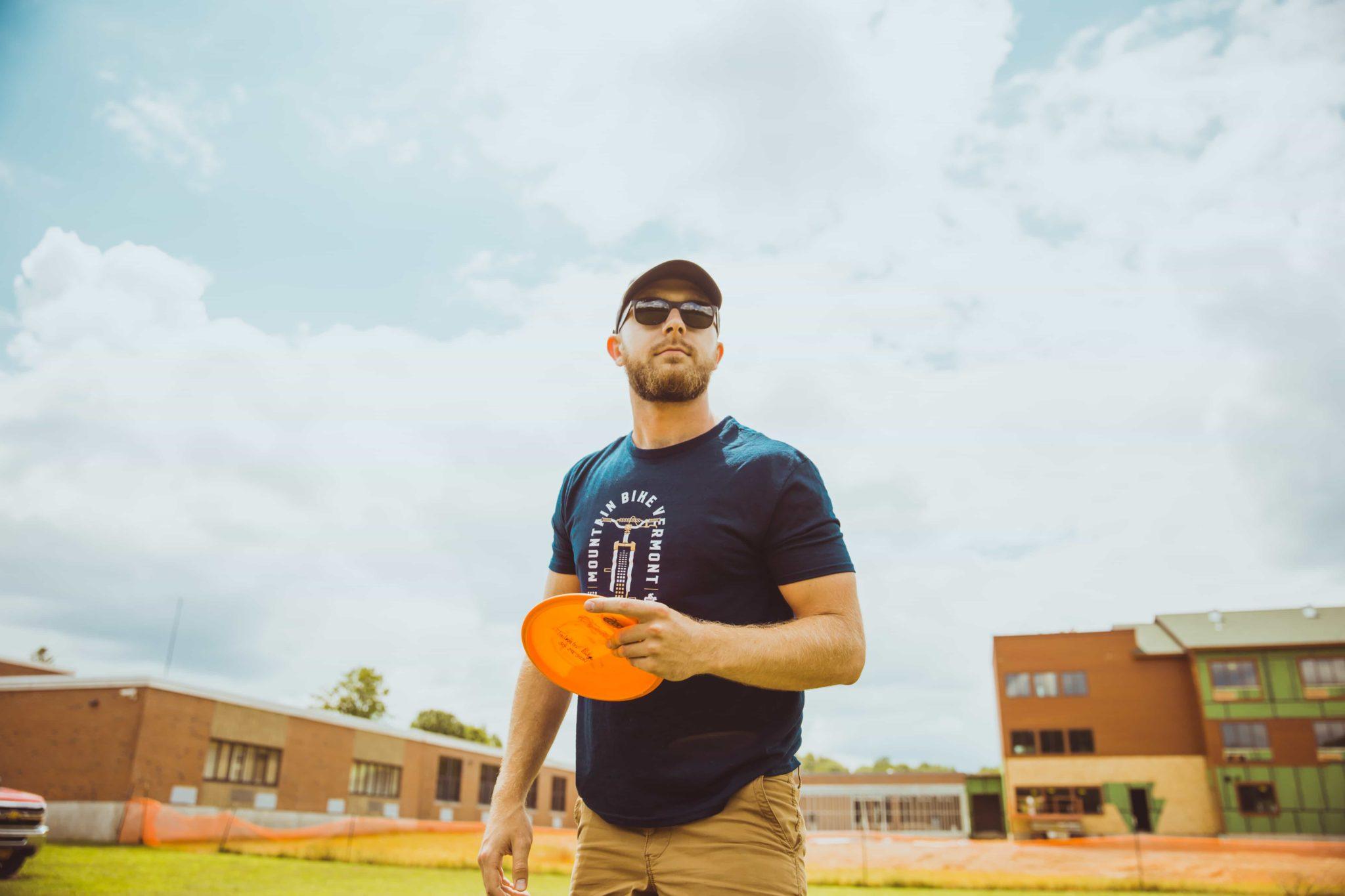 Man with disc golf disc